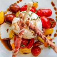 Villagio Burrata · Heirloom tomatoes drizzled with olive oil and balsamic glaze, topped with basil. Served with...