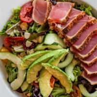 Seared Tuna Salad  · Spring mix lettuce with diced avocado, dried cranberries, grape tomatoes, cucumbers and toas...