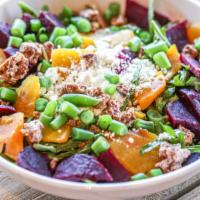 Beet Salad (Lg) · Roasted beets, green beans and arugula in a lemon vinaigrette, topped with honey goat cheese...