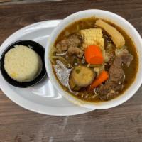 Sopa De Res (Spicy)/Beef Stew · servido con arroz, cilantro, cebolla y jalapeños/ served with rice, cilantro, onions, and ja...