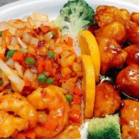 Dragon & Phoenix · General Tso's chicken on one side, jumbo shrimp with chili pepper on the other side. Hot and...