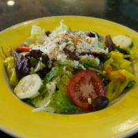 Greek Salad · House salad topped with feta cheese.