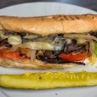 Steak Or Chicken & Cheese Sub · Lettuce, tomato, grilled onion, provolone, and mayo.