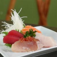 Sashimi Sampler · Tuna (two), salmon (two), yellowtail (two), and albacore (two) with ponzu sauce.