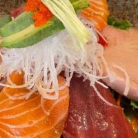 Sashimi Salad · Tuna, salmon, yellowtail, cucumber and daikon on spring mix with ponzu sauce and ginger dres...