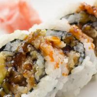 Shrimp Tempura Roll · Shrimp tempura, cucumber, avocado, daikon sprouts, masago and eel sauce.