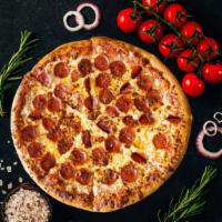 Pepperoni Bomb Pizza · Homemade pizza dough, pepperoni, mozzarella, provolone, and Parmesan.