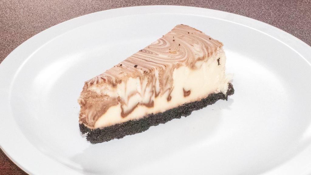 Cheesecake  · Classic cheesecake with a rich, dense, smooth, and creamy consistency.