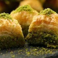 Baklava 1 Pc · Layered pastry dessert made of filo pastry, filled with chopped nuts, and sweetened with syr...