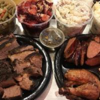 Bbq Family Feast · Feeds 12. Includes one rack of spare ribs, one lb of chicken breast, two pounds of brisket, ...