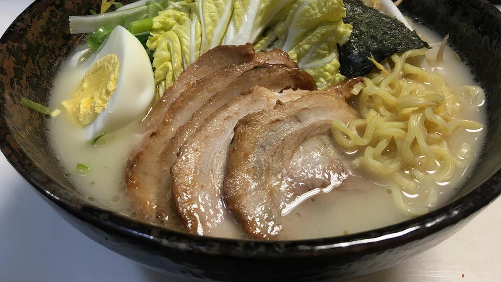 Sura Ramen · Ramen noodle soup in chicken and pork broth. Toppings: bean spouts, brocoli, hot broiled egg, sliced meat, mushroom, cabbage