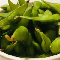 Edamame · Salted steamed green soy beans.
