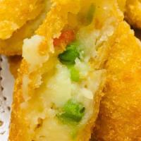 Vegetable Croquette · Deep fried mashed potato with assorted vegetables.