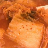 Kimchee Jjigae · Hot. Traditional Koran stew made with kimchee,  and tofu in a hot pot served with rice.(choo...