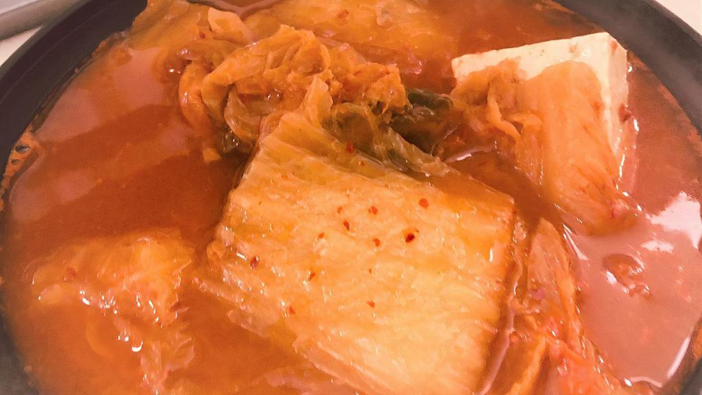 Kimchee Jjigae · Hot. Traditional Koran stew made with kimchee,  and tofu in a hot pot served with rice.(choose the meat)