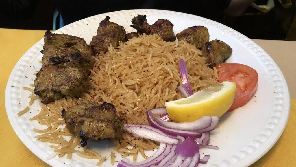 Kabab Gosfand · Chunks of tender lamb, marinated in special spices and garlic, broiled on a skewer.