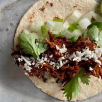 Pulled Pork (3 Tacos) · Hot, gluten free. Pulled pork, tomatillo salsa, mexican brick sauce, and queso fresco.