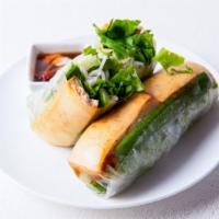 Sautéed Tofu Roll · Lettuce, mint, cucumber, white onion, beansprout, fried shallot and peanut wrapped in rice p...