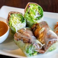 Gòi Cuõn - Fresh Salad Rolls (2 Rolls) · Rice paper rolls with rice vermicelli, bean sprouts, diced cabbage and lettuce served with f...