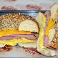 2 Eggs W/ Meat & Cheese Sandwich · 2 Eggs with either Bacon, Ham, Sausage or Canadian Bacon with your choice of Cheese