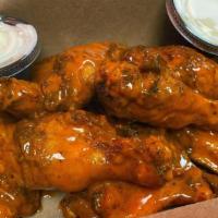 Chicken Wings · Marinate in the sauce or put on the side. Tons of sauces to choose from, from mild to hot as...