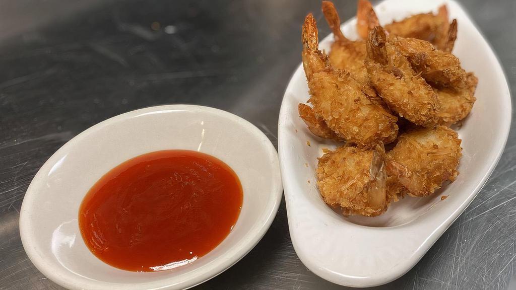 Coconut Shrimp · All the great flavor without the aftertaste. Try our fried coconut breaded butterfly shrimp. Served with Honey Sriracha Sauce.