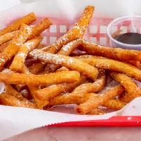 Funnel Cake Fries · Covered in powdered sugar with your choice of 10 different saucies!