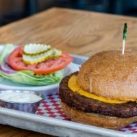 Vegan Burger · House-made farro, mushroom, zucchini, red onion, miso & flax patty. Served on a vegan bun w/...