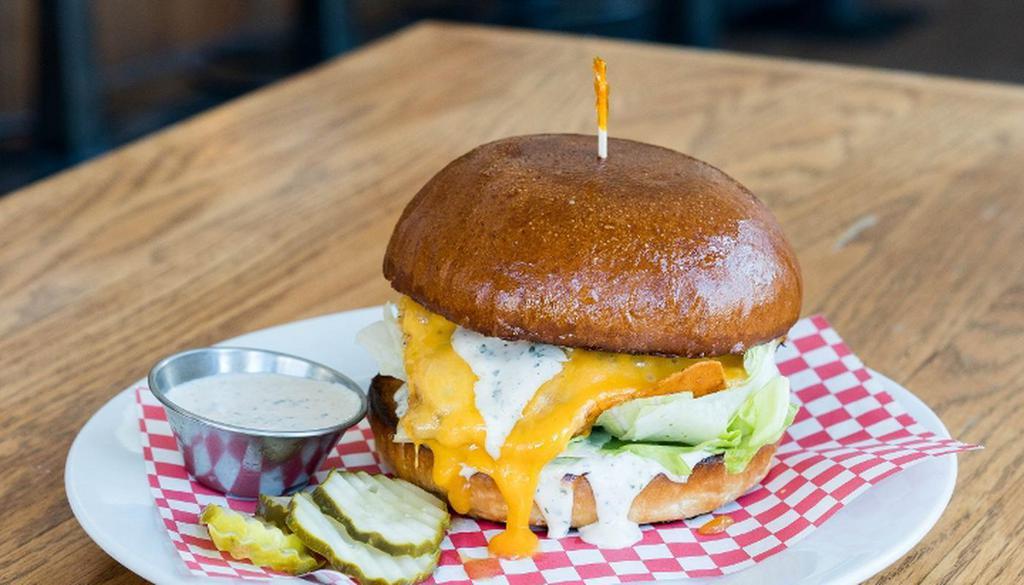 Grilled Chicken Sando · Naked Truth chicken breast, Cheddar cheese, iceberg lettuce, & ranch. Served on a Parker House bun. Our Mary's chicken is air chilled & free of antibiotics & added hormones.