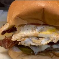 Texas Cheeseburger · Fried egg, bacon and cheese.