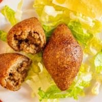 Kibbeh (4 Pc) · Beef, cracked wheat, and spices filled with ground beef, onions, pine nuts, and spices.