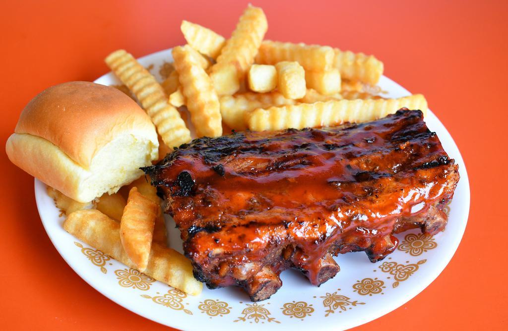 Rib Snack · 1/2 rack tender, meaty baby back ribs, small side order, BBQ sauce and dinner roll.