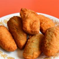Jalapeno Poppers · 5 pieces stuffed with cheddar cheese.