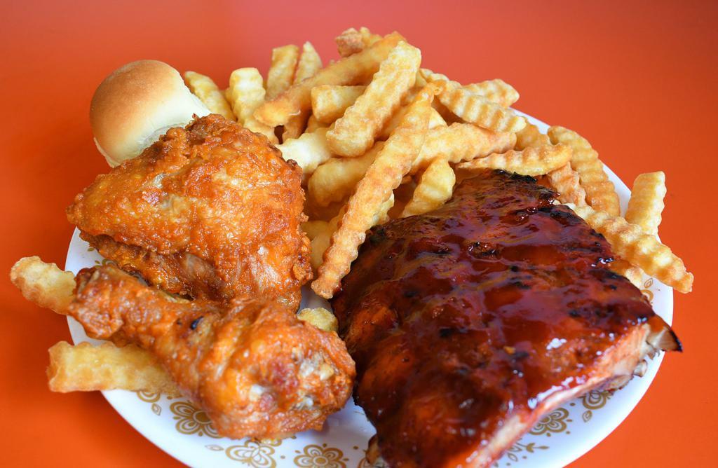 Chicken And Rib Combo Dinner · 2 pieces of juicy fresh chicken. 1/2 lb. tender meaty baby back ribs, small side order and dinner roll.