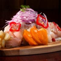 Fresh Peruvian Ceviche · Made fresh when you order it!
Fresh fish, onions, corn,s weet potato, cooked in lime juice.