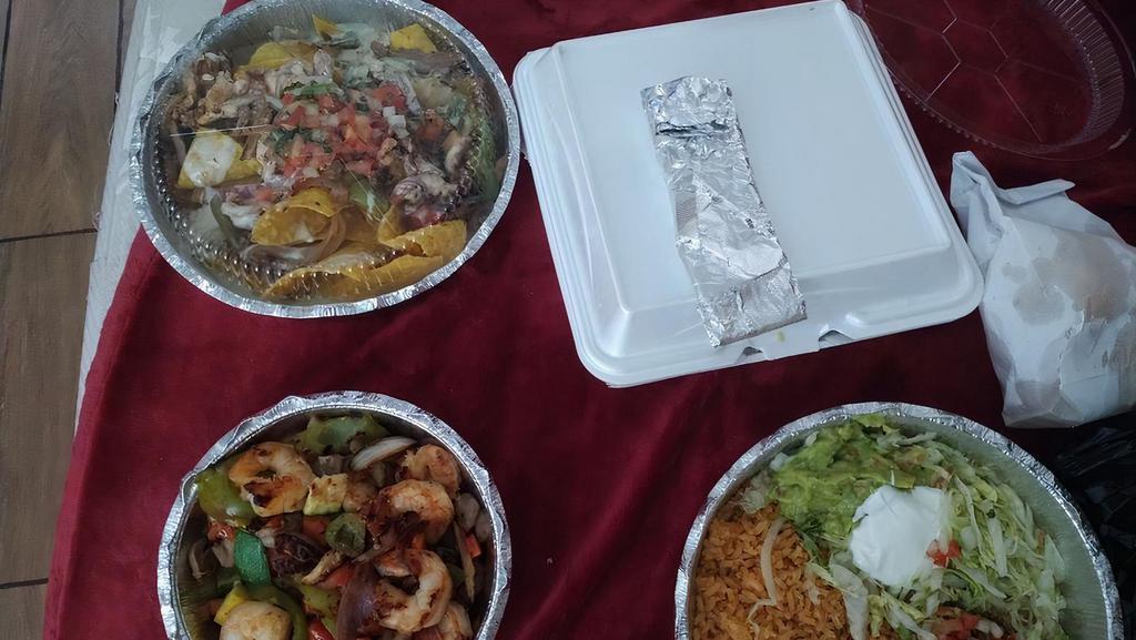 Express Lunch Build Your Own Plate · All include rice & beans. Extra cheese sauce 
Choose 3 sides 
Burrito- Enchilada- Tacos- Tamale- Taquitos- Chile Relleno- Quesadilla - Chalupa- Chile con Queso- Tostada and Rice & Beans.