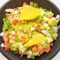 Guacamole Casero · Fresh cut avocado mixed with onions, tomatoes, jalepenos, cilantro and lime juice.