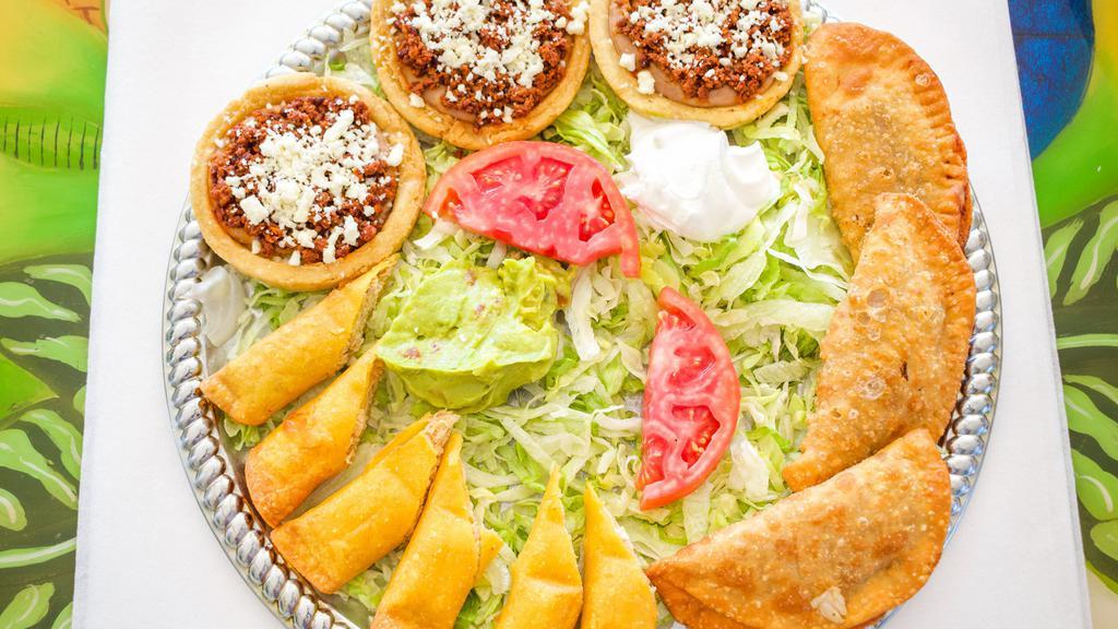 Sombrero Mexicano · New. Serves three to four. Mexican flavors with beans & chorizo’s sopecitos, beef flautas, cheese quesadillas, beef empanadas, served with guacamole, sour cream, and tomato slices.