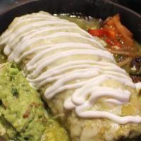 Jalisco Burrito · Covered with gravy and cheese. Your choice of meat with beans inside. Served with salad, gua...