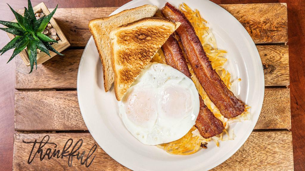 Bacon, Egg And Cheese · Served with hash browns.