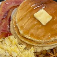 Pancake Plate · includes 2 eggs, choice of sausage or bacon, and 2 pancakes.