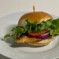 Blackened Chicken Sandwich · Grilled chicken coated with blackened seasoning served on a toasted bun with your choice of ...
