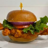 Buffalo Chicken Sandwich · Breaded Chicken dipped in our buffalo sauce, served on a toasted bun with ranch, lettuce, to...
