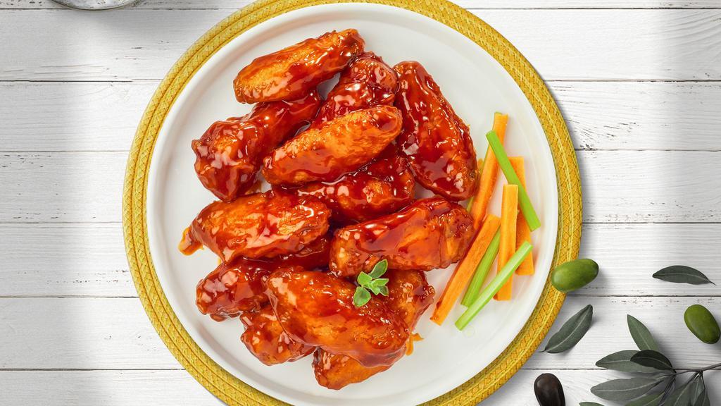 Blessed Buffalo Wings · Breaded or naked fresh chicken wings, fried until golden brown, and tossed in buffalo sauce. Served with a side of ranch or bleu cheese.
