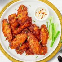 Classy Classic Wings · Breaded or naked fresh chicken wings until golden brown. Served with a side of ranch or bleu...