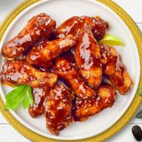 Bbq Breezy Wings (Boneless) · Boneless breaded fresh chicken wings, fried until golden brown, and tossed in barbecue sauce...