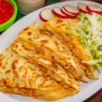 Quesadilla · Meat of your choice and Oaxaca cheese melted in a flour tortilla. On the side is lettuce, Co...