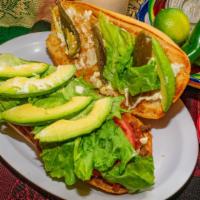 Tortas · Mexican sandwich made with refried beans, meat of your choice, melted Oaxaca cheese, lettuce...