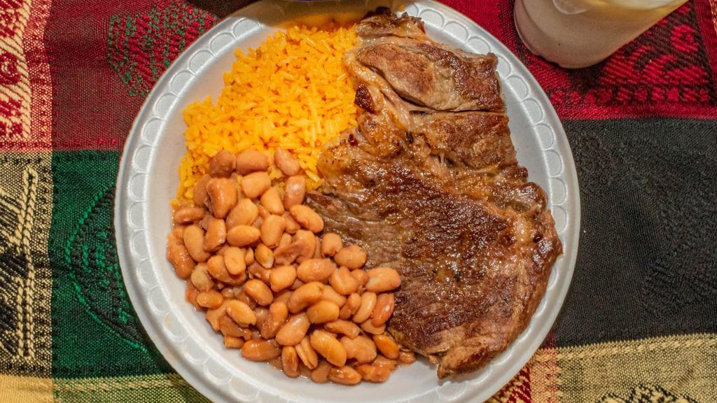 Carne Asada Lunch · Grilled steak with rice and whole pinto beans. Also comes with a side of fresh corn tortillas and 2 salsas. Add ons include grilled jalapeños, onions, Mexican chorizo and eggs for an additional cost