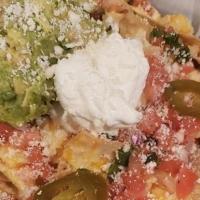 Nachos Grande · Fresh made tortilla chips covered with our Nautilus Tavern's tequila infused cheese sauce, p...